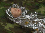 Wrap the newborn in foil if necessary