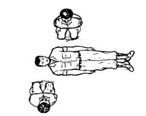 Figure 4-4. Rescuers positioned for two-rescuer CPR.