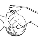 Figure 6-1. Performing a jaw -thrust on an infant.