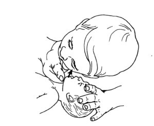 Figure 6-2. Checking an infant for breathing.