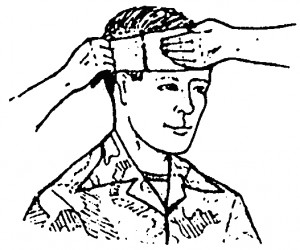 Figure 5-2. Wrapping a tail horizontally around the head (wound on forehead).