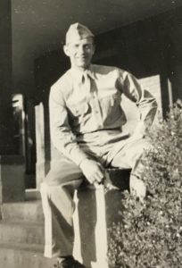 Tom outside his dorm (East Hall) at Arizona State College, Tempe, Arizona, spring, 1943.