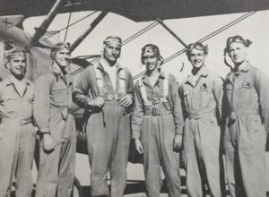 Mr. John B. Harbin with his student pilots (from left), J.H.Gist, R.I. Gloos, Mr. Harbin, J.A.L. Gervais, T.E. Cartmell, M.D. Barratt. Thunderbird II Army Air Base, Phoenix, Arizona, October, 1943
