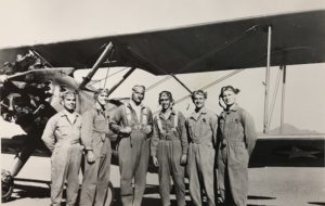 John Hardin ("Long John", third from left) with his student pilots (Tom Cartmell is fifth from left)