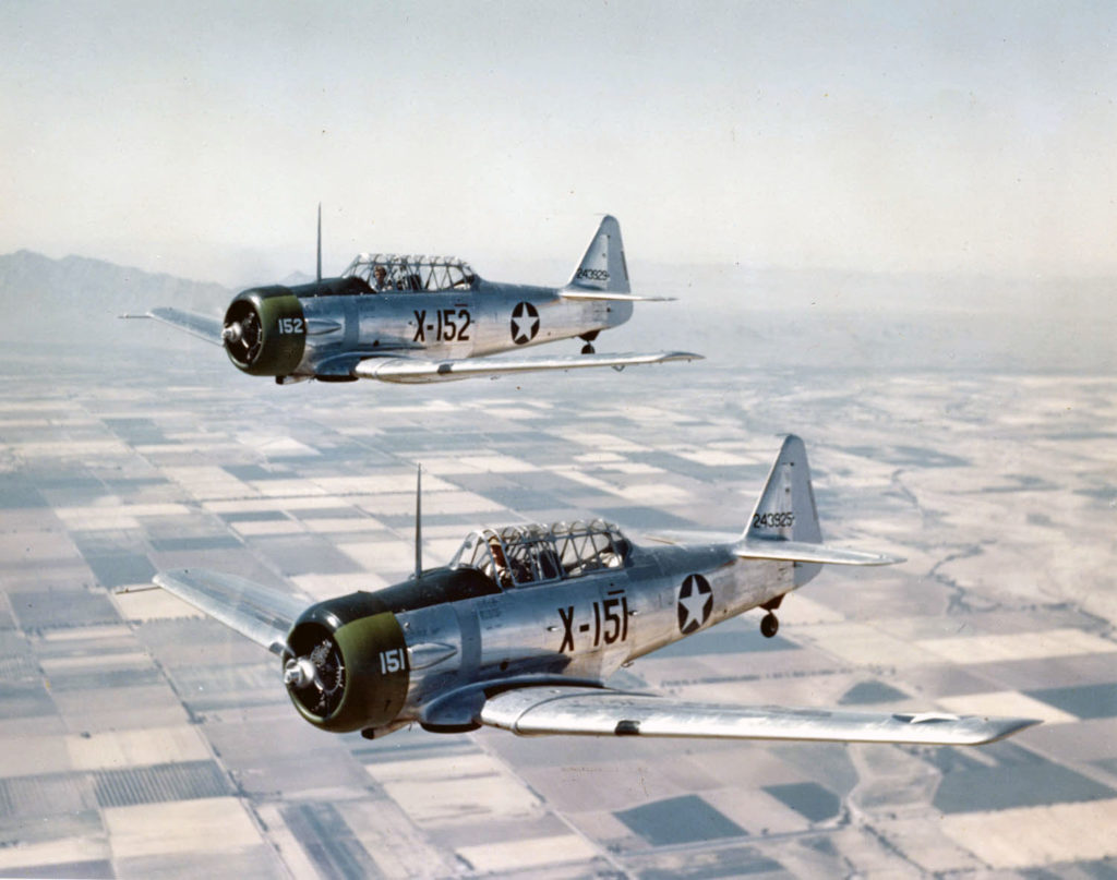 AT-6C_Texans_in_flight_1943