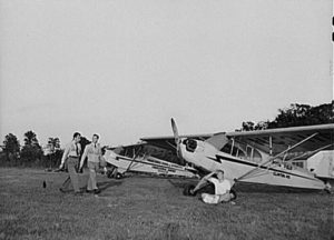 Student fliers with Piper J-3s under the Civilian Pilot Training Program. Congressional Airport. Rockville, Maryland