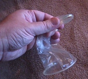 Inner ring of the Female Condom compressed for insertion into the vagina