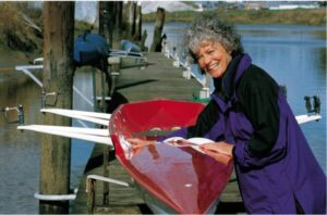 Menopausal woman with two-person rowing shell
