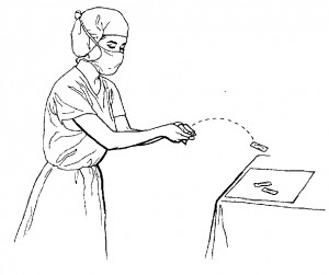 Figure 1-4. Circulating nurse "flipping" sterile suture material from a suture packet onto the back table.