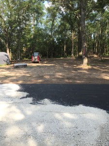Tons of gravel were placed over the landscaping fabric.